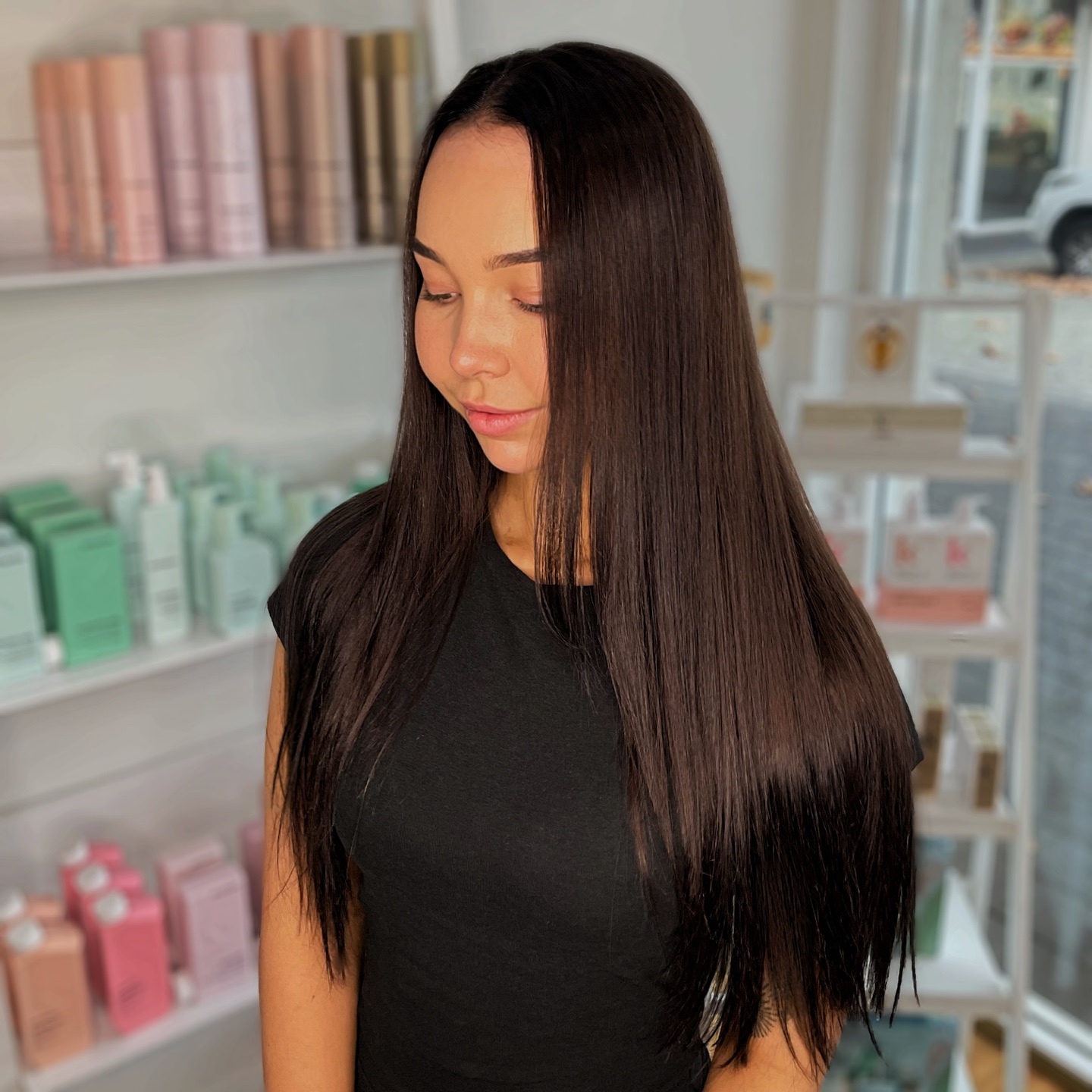 Long brunette colour by Shani, photographed in the salon